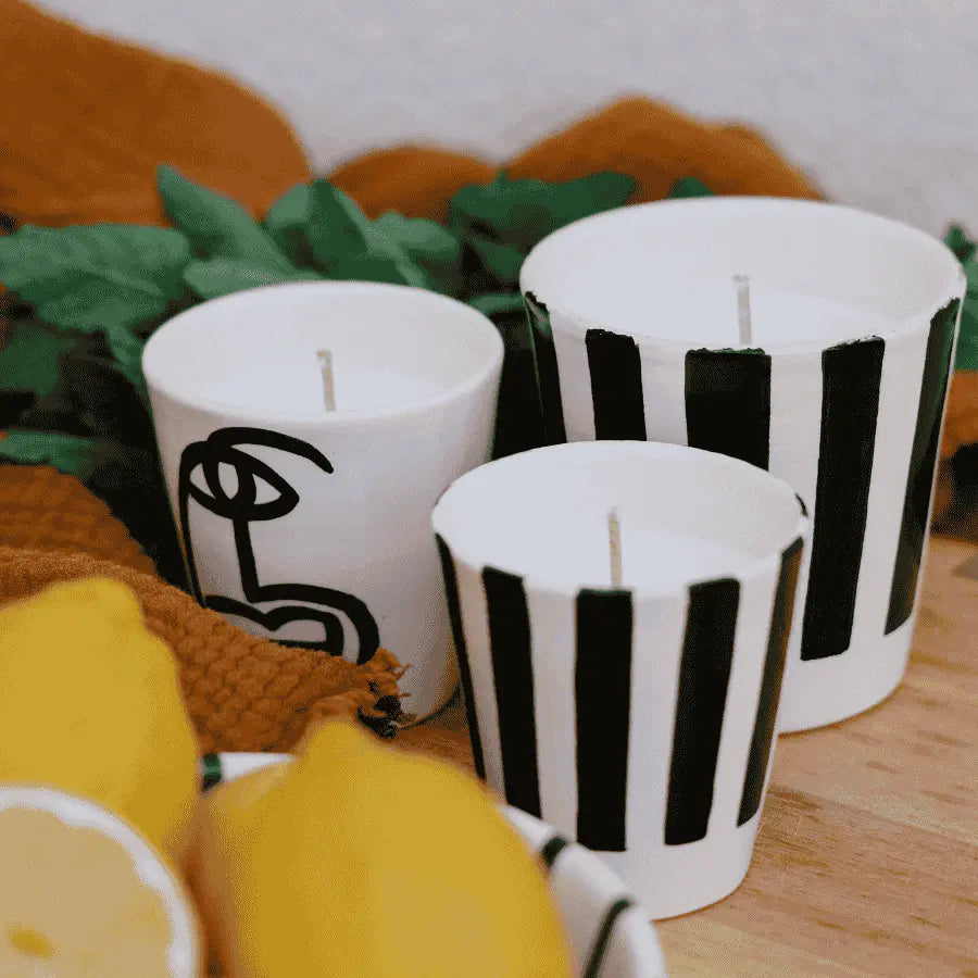 Bougie haut de gamme au parfum boisé et chaleureux, fabriquée à la main